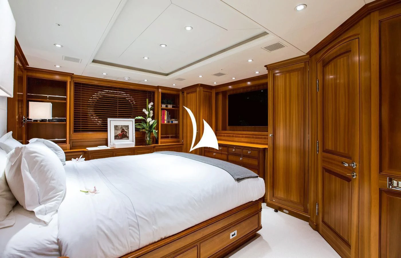 a bedroom with a large bed aboard PERSEUS Yacht for Sale
