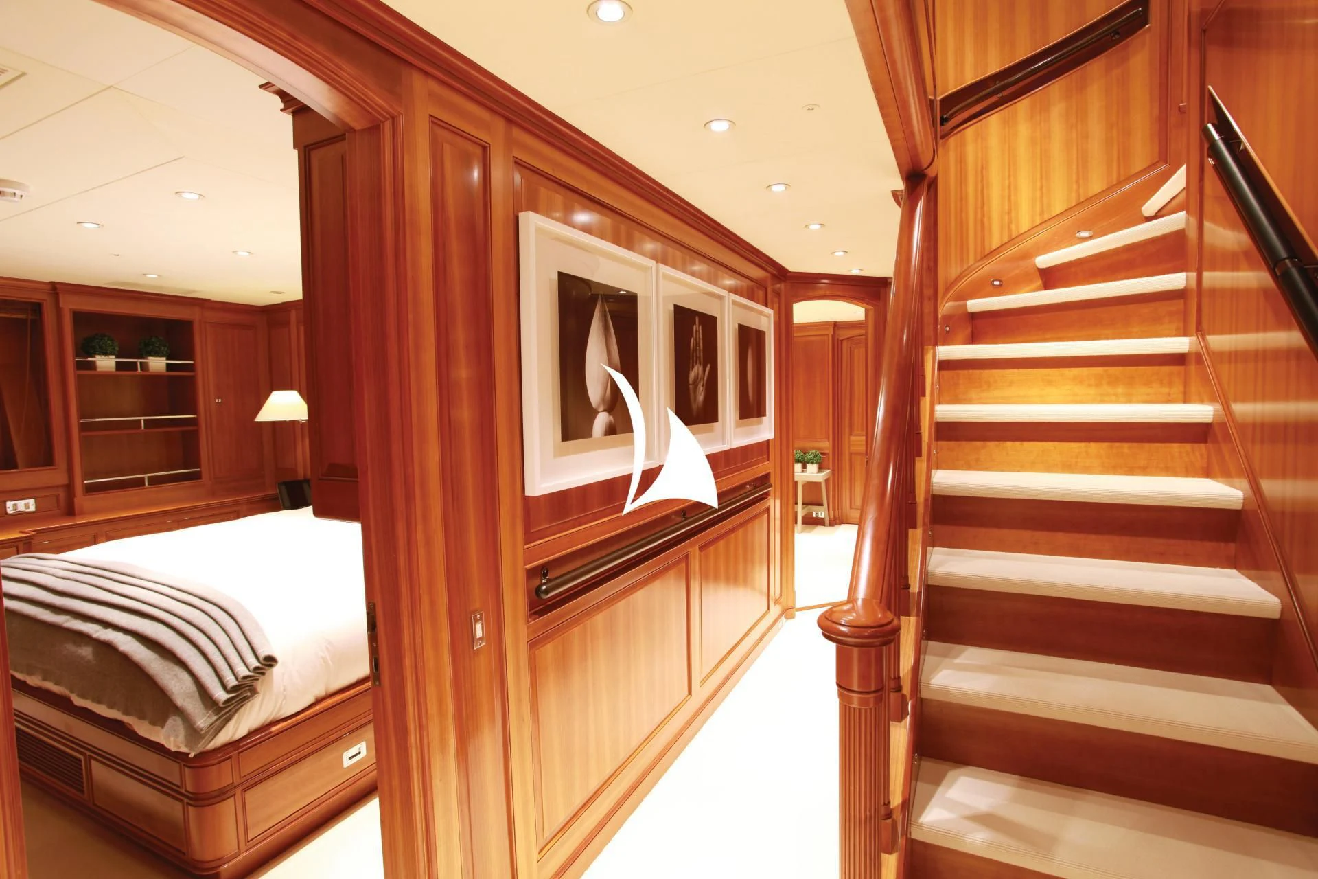 a room with a bed and a mirror aboard PERSEUS Yacht for Sale