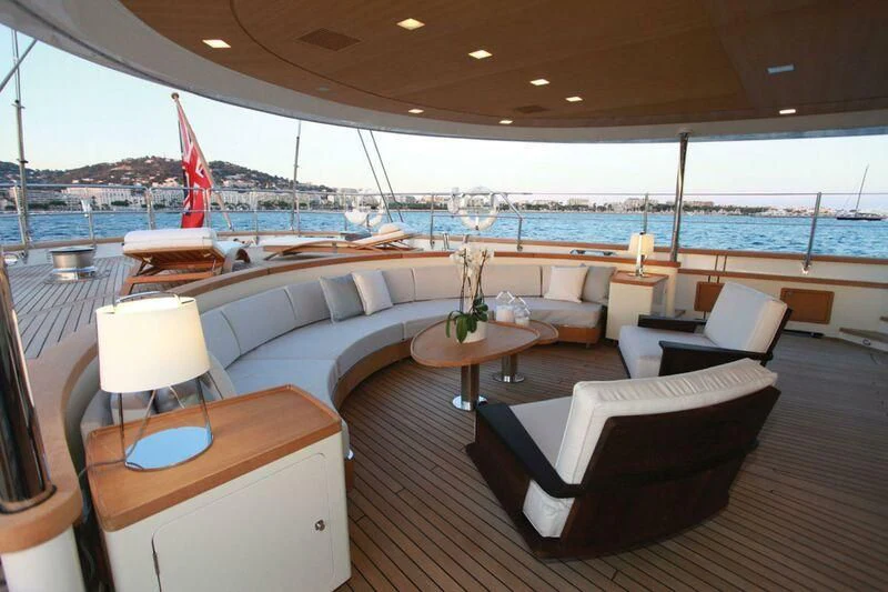 a room with a table and chairs aboard PERSEUS Yacht for Sale