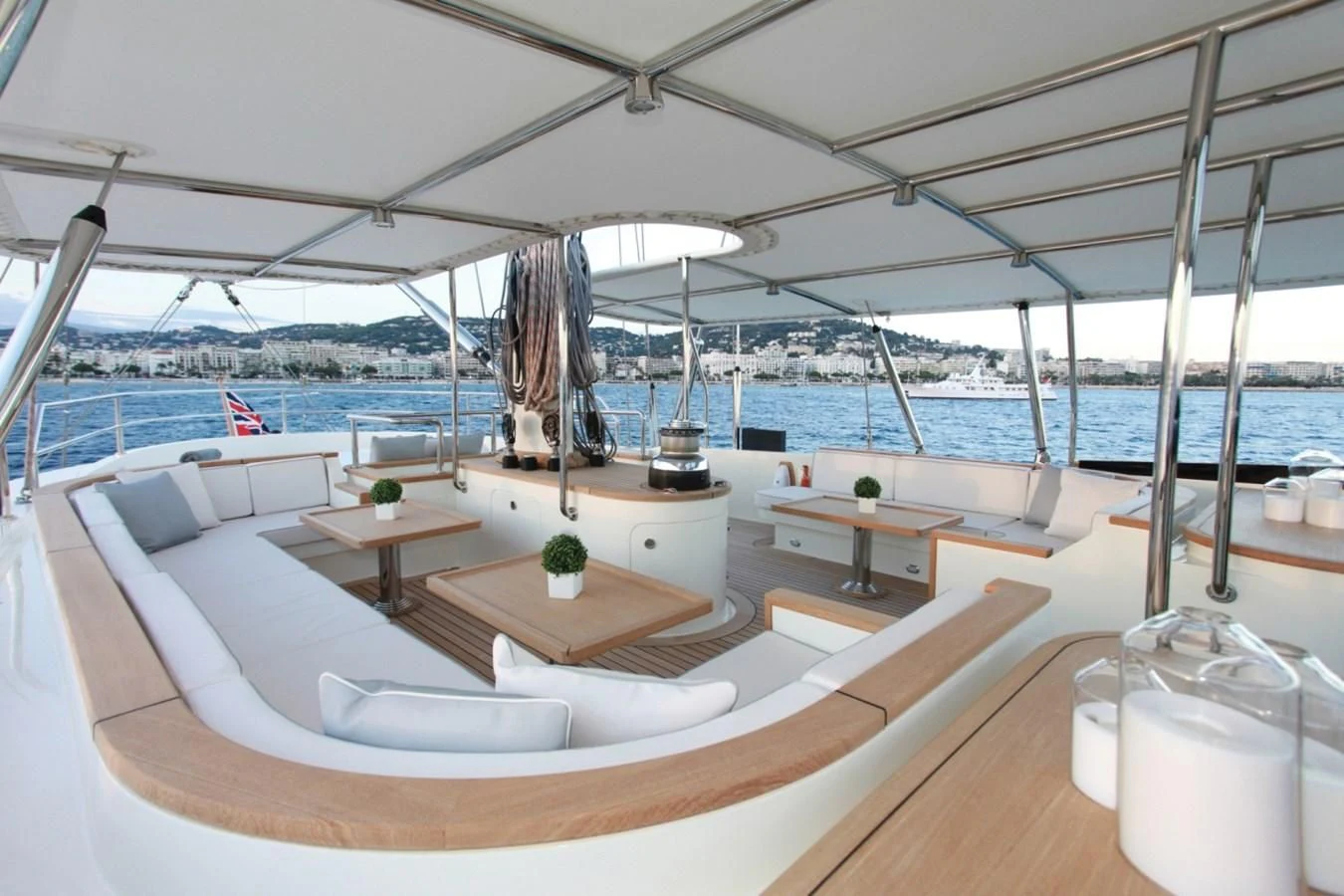 a room with a view of the water and a city aboard PERSEUS Yacht for Sale