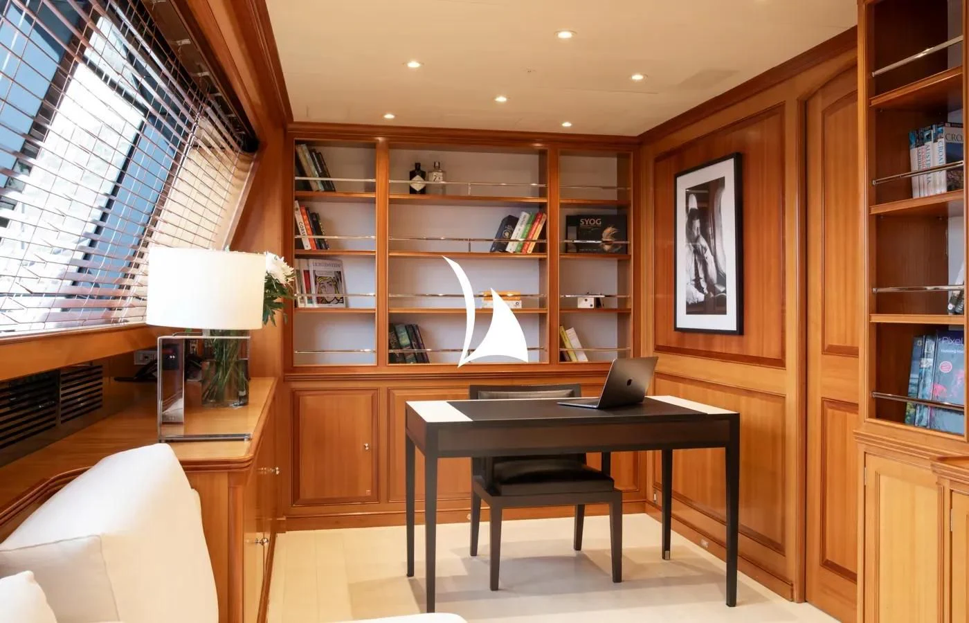 a room with a desk and a chair aboard PERSEUS Yacht for Sale
