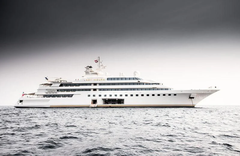 a large white ship in the water aboard LADY MOURA Yacht for Sale