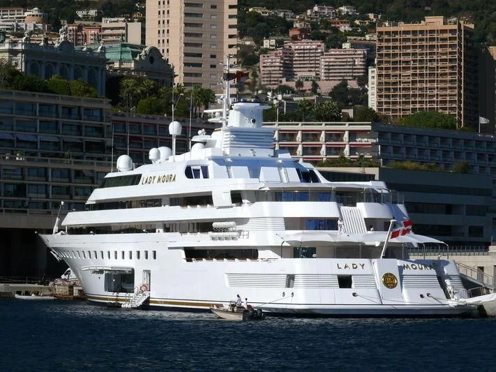 a large white boat in the water aboard LADY MOURA Yacht for Sale