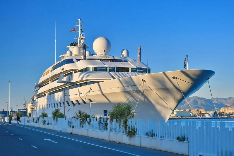 a large cruise ship docked aboard LADY MOURA Yacht for Sale