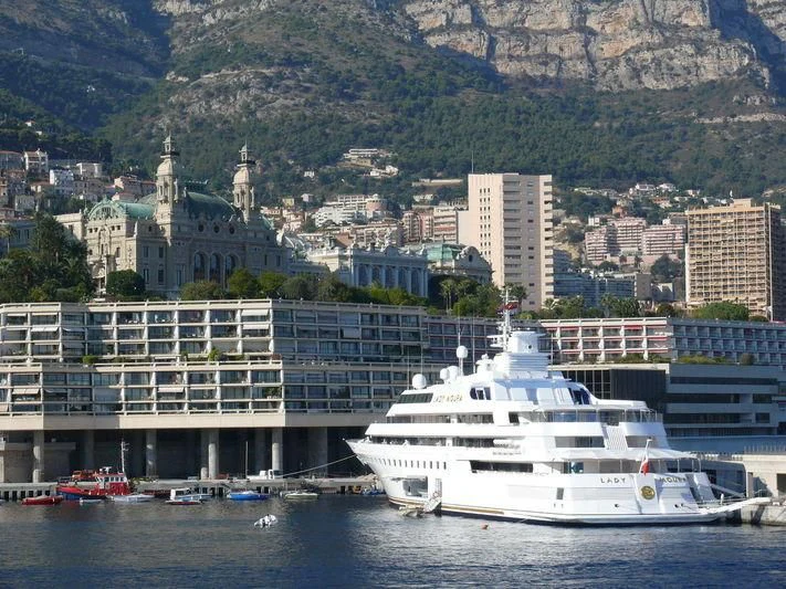 a large white boat in the water aboard LADY MOURA Yacht for Sale