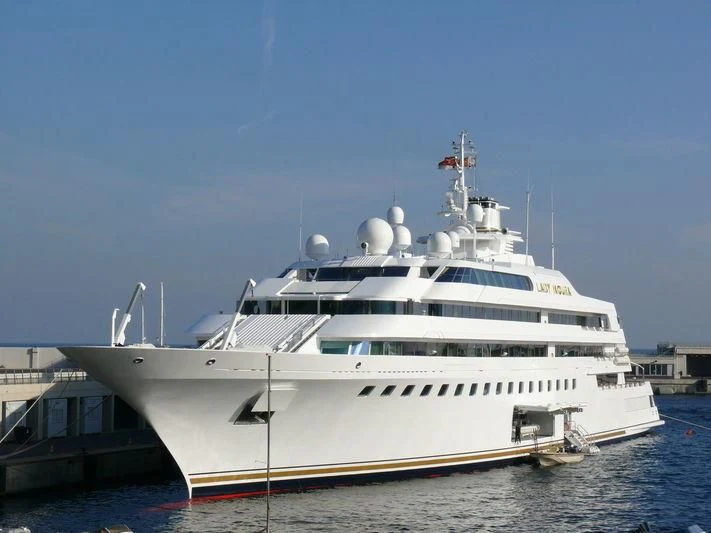 a large white yacht aboard LADY MOURA Yacht for Sale