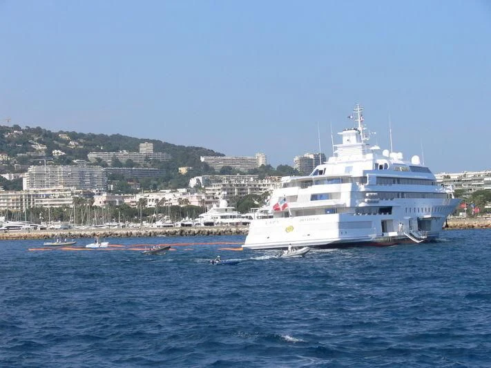 a large white boat in the water aboard LADY MOURA Yacht for Sale