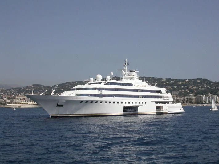 a large white yacht in the water aboard LADY MOURA Yacht for Sale