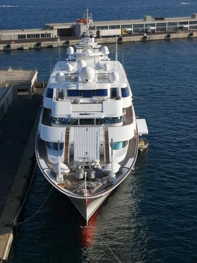 a large white boat in the water aboard LADY MOURA Yacht for Sale
