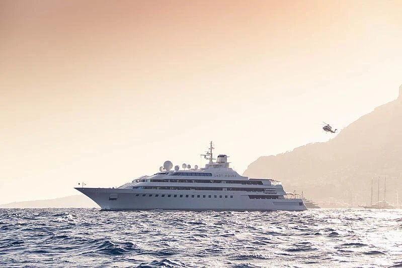 a large ship in the water aboard LADY MOURA Yacht for Sale