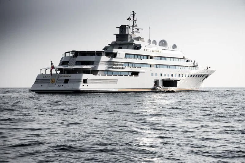 a large white ship in the water aboard LADY MOURA Yacht for Sale