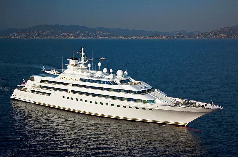 a large white ship in the water aboard LADY MOURA Yacht for Sale