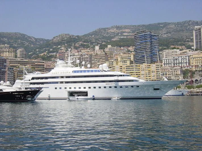 a large white boat in the water aboard LADY MOURA Yacht for Sale