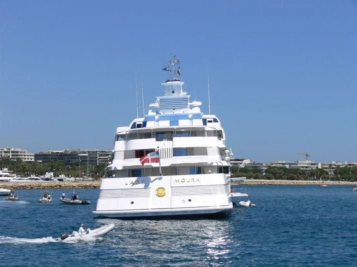a large white boat in the water aboard LADY MOURA Yacht for Sale