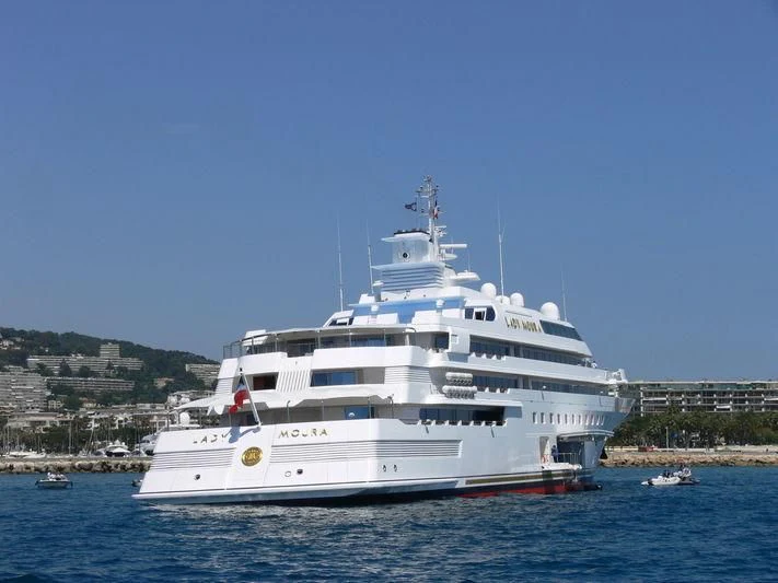 a white yacht in the water aboard LADY MOURA Yacht for Sale