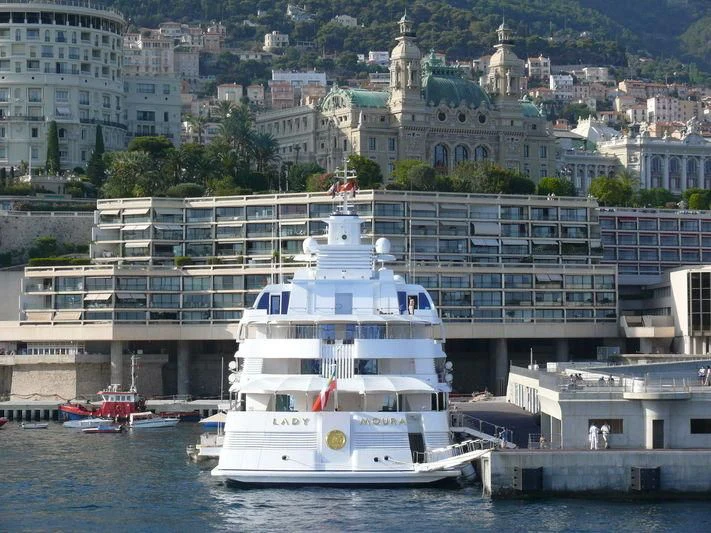 a large white boat in the water aboard LADY MOURA Yacht for Sale