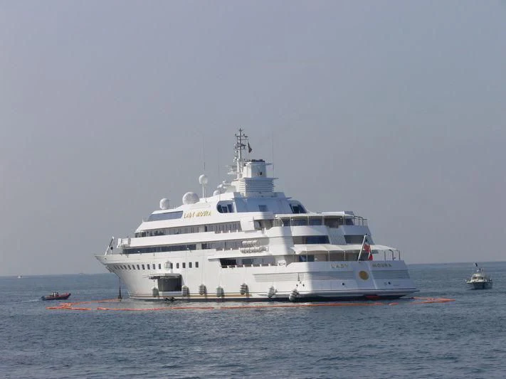 a large white ship in the water aboard LADY MOURA Yacht for Sale