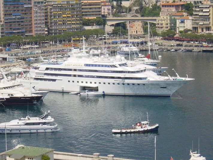 a large white ship in the water aboard LADY MOURA Yacht for Sale