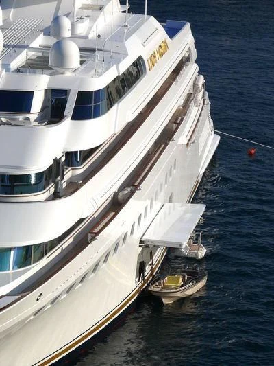 a large white boat on the water aboard LADY MOURA Yacht for Sale