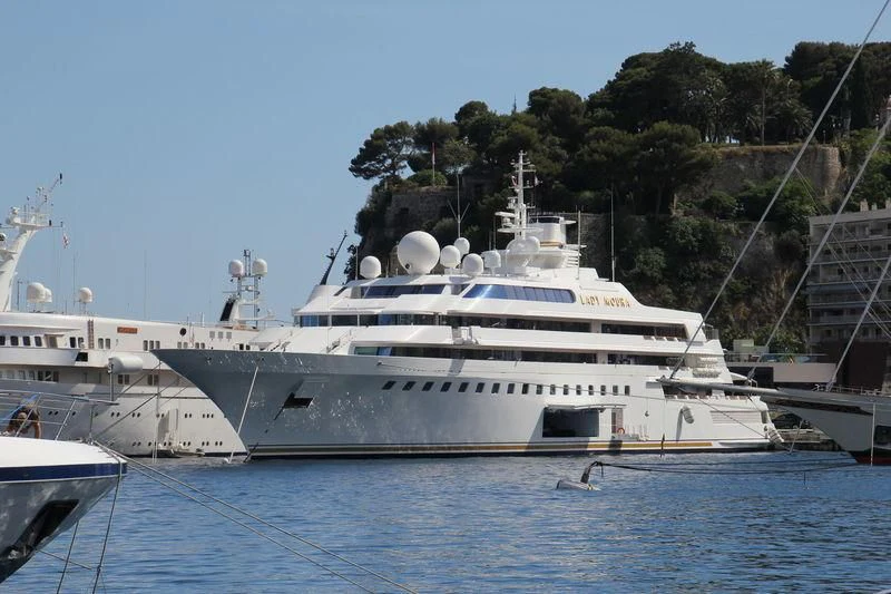 a large white yacht aboard LADY MOURA Yacht for Sale