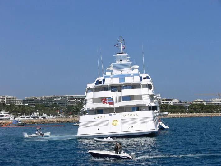 a large white boat in the water aboard LADY MOURA Yacht for Sale