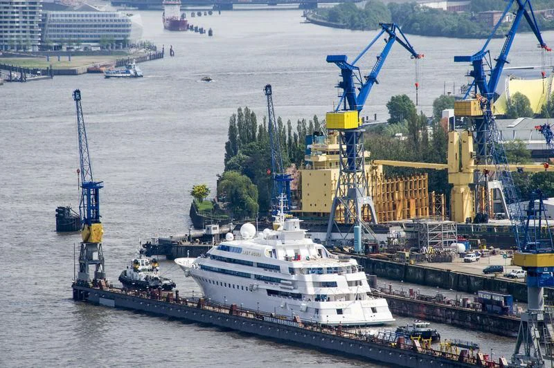 a large ship in the water aboard LADY MOURA Yacht for Sale