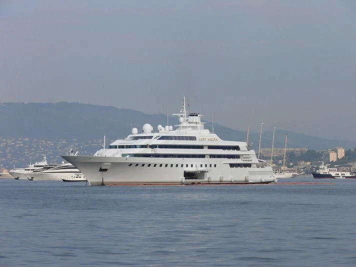 a large white ship in the water aboard LADY MOURA Yacht for Sale