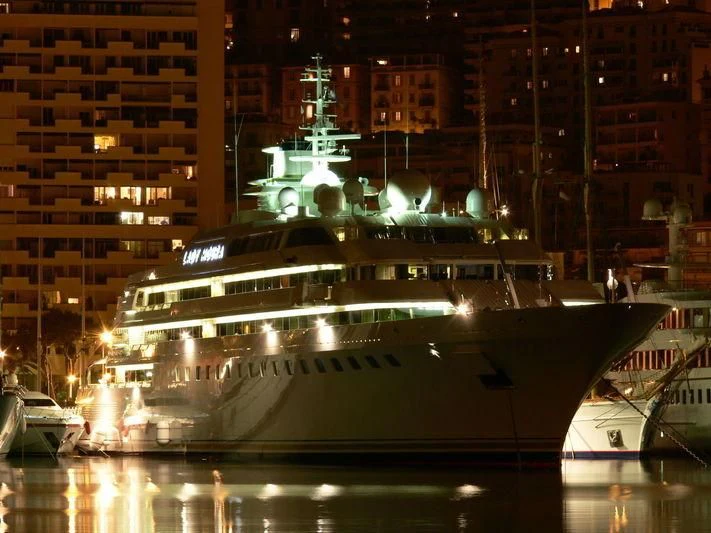 a large boat in a city aboard LADY MOURA Yacht for Sale