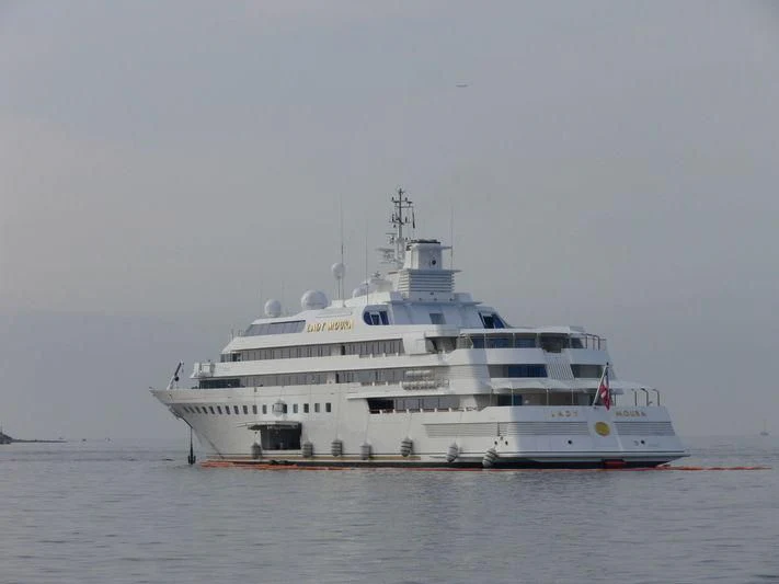 a large white ship in the water aboard LADY MOURA Yacht for Sale