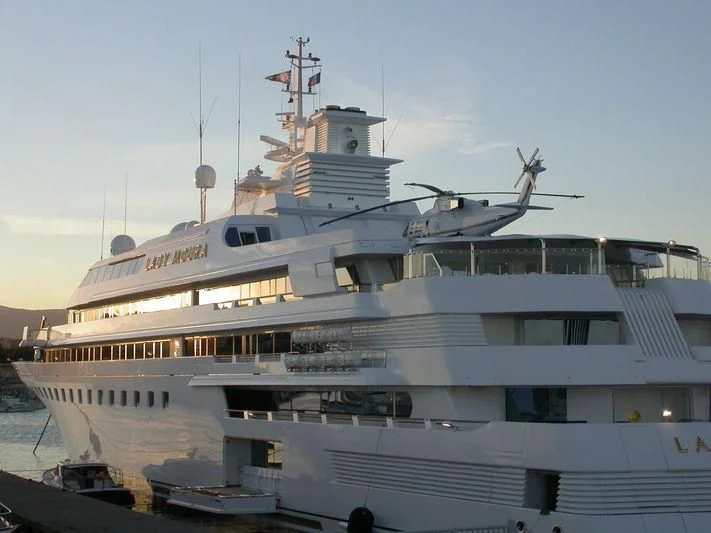 a large white ship aboard LADY MOURA Yacht for Sale