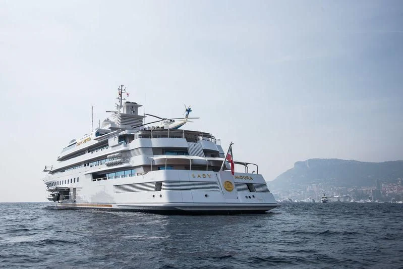a white yacht in the water aboard LADY MOURA Yacht for Sale