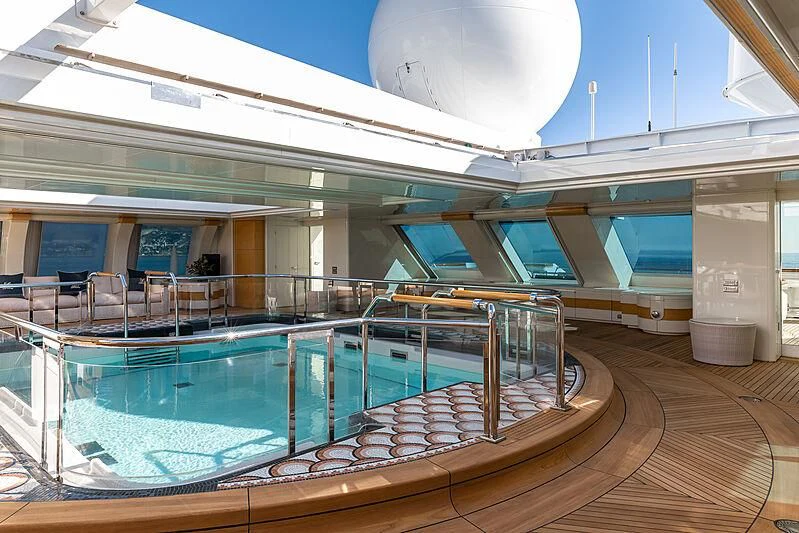 a swimming pool in a building aboard LADY MOURA Yacht for Sale