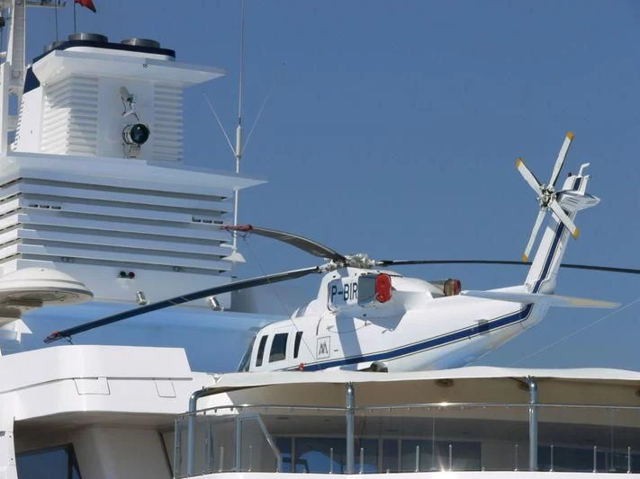 a couple of white boats on a dock aboard LADY MOURA Yacht for Sale