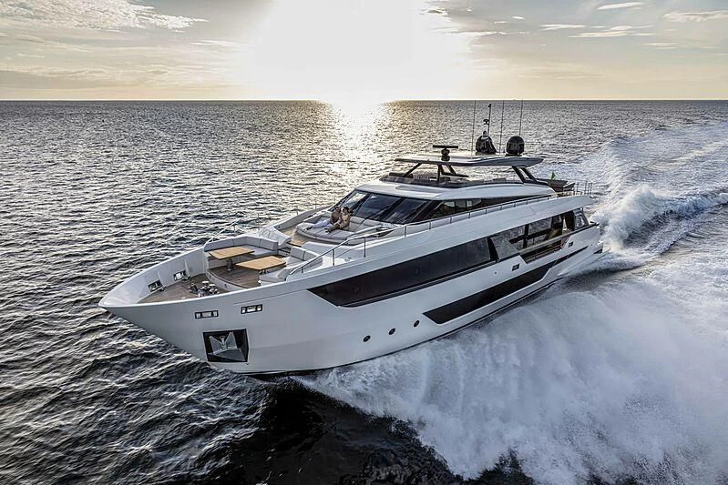 a white yacht on the water aboard EPIC Yacht for Sale