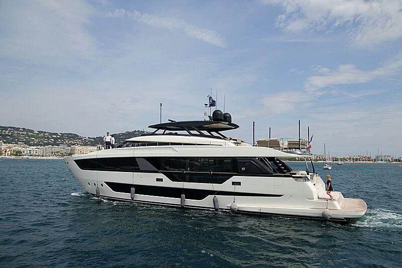 a white yacht in the water aboard EPIC Yacht for Sale