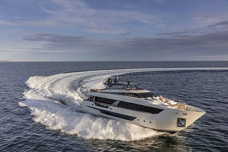 a white yacht on the water aboard EPIC Yacht for Sale