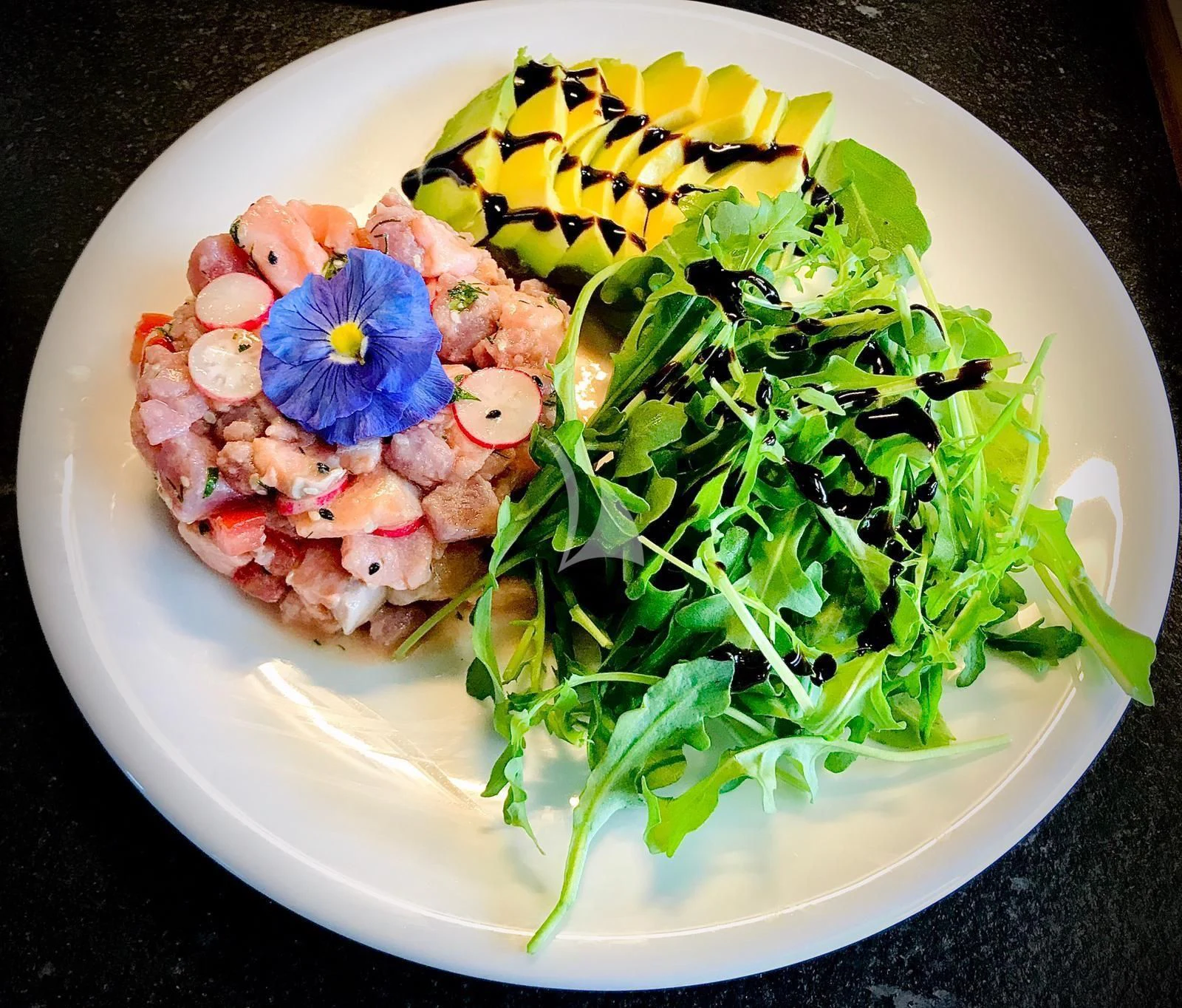 a plate of food aboard EPIC Yacht for Sale