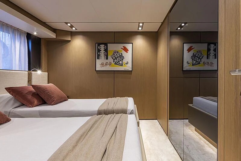 a hotel room with a bed aboard EPIC Yacht for Sale