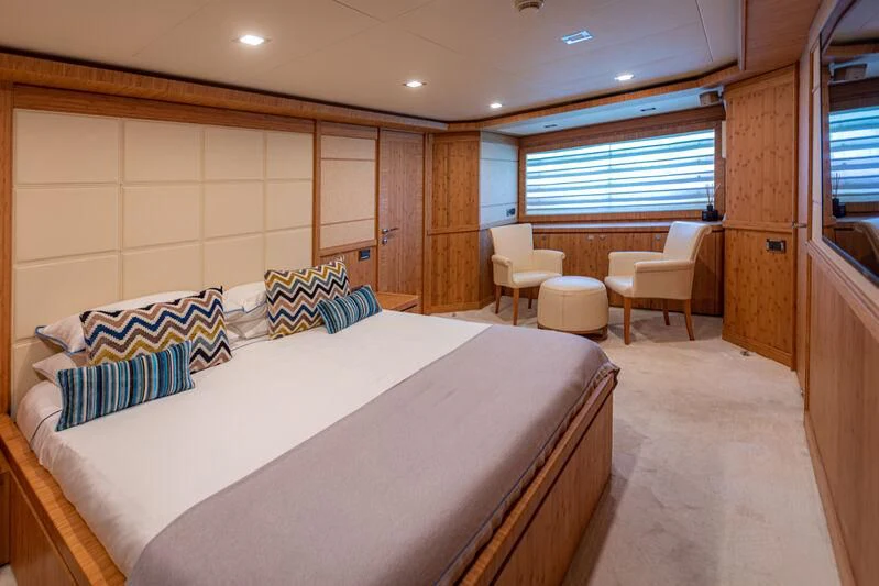 a large bedroom with a large bed aboard MARIDAKI Yacht for Sale