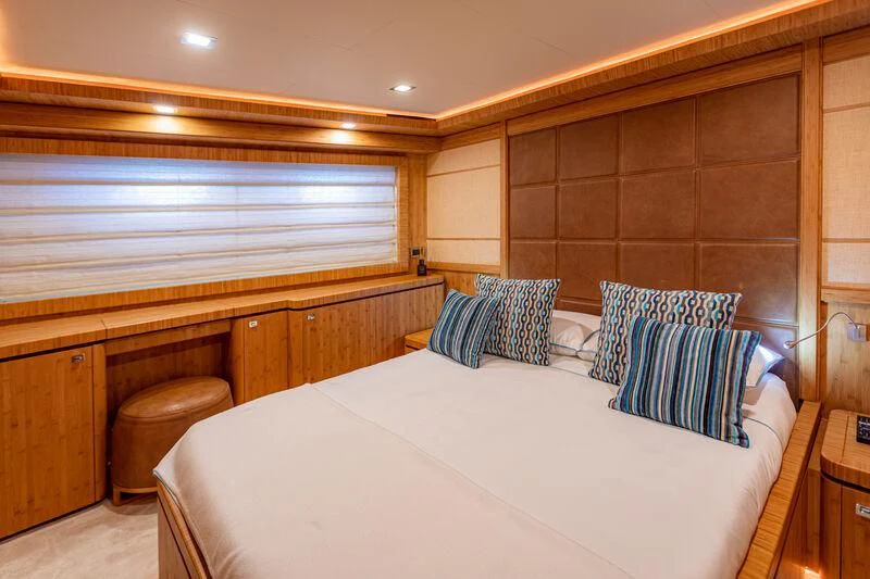 a bedroom with a bed aboard MARIDAKI Yacht for Sale