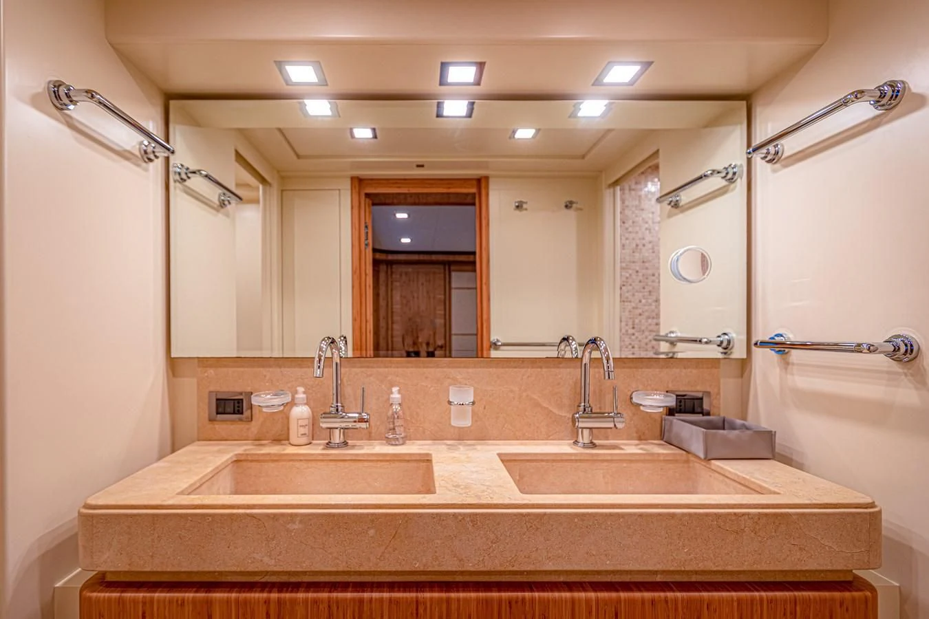 a bathroom with a large mirror aboard MARIDAKI Yacht for Sale