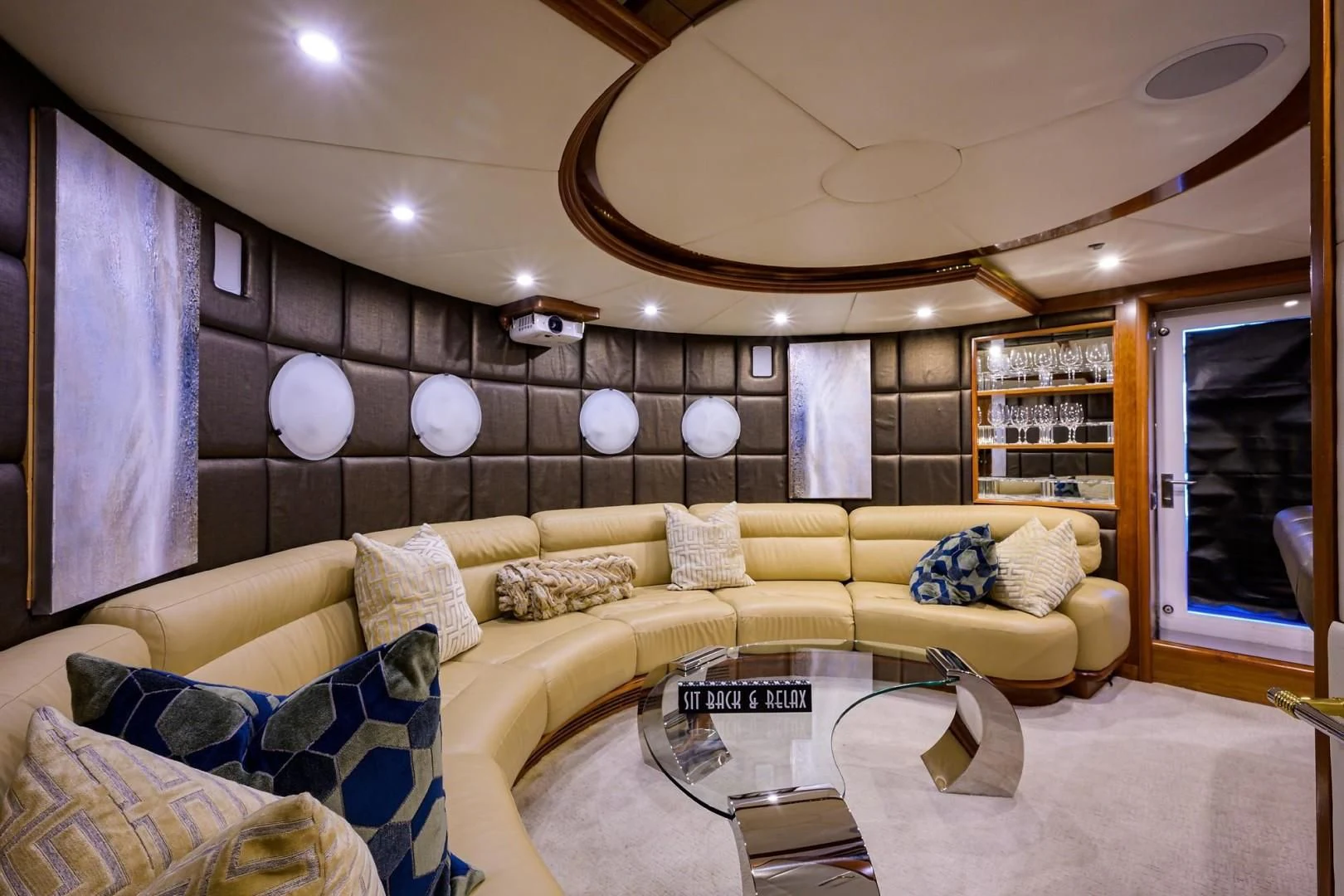 a living room with a couch and a coffee table aboard CABERNET Yacht for Sale