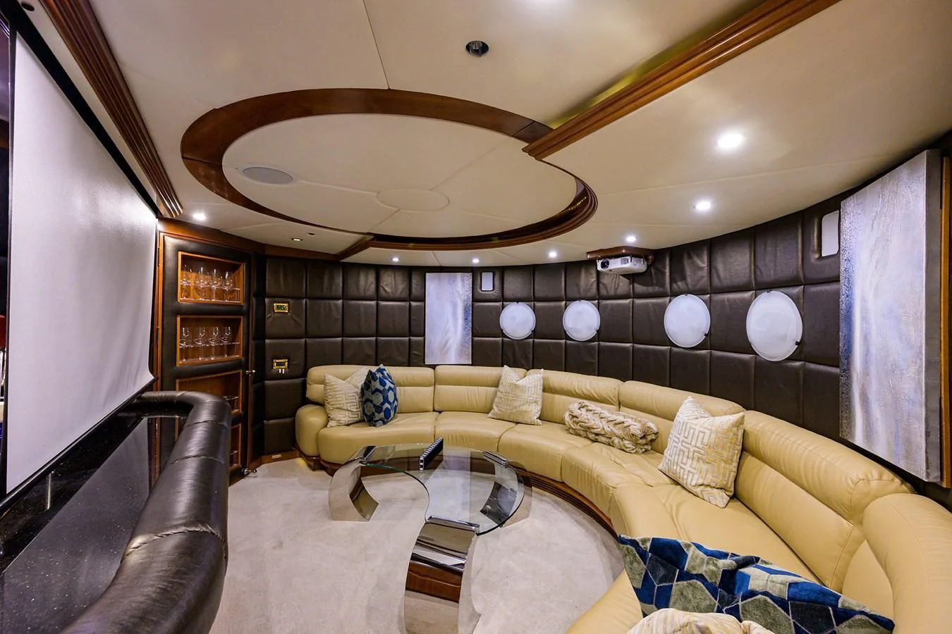 a living room with a couch and a table aboard CABERNET Yacht for Sale