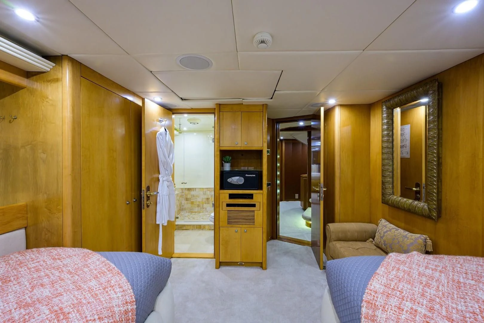 a bedroom with a bed and a closet aboard CABERNET Yacht for Sale