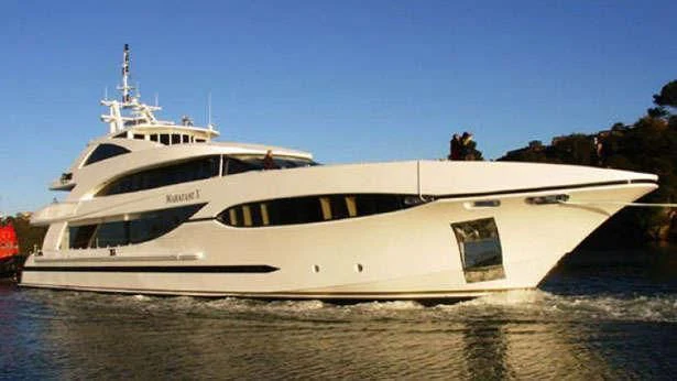 a white yacht on the water aboard CABERNET Yacht for Sale