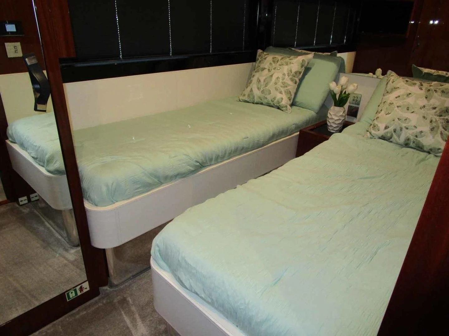 a bed with a pillow aboard REGENCY Yacht for Sale