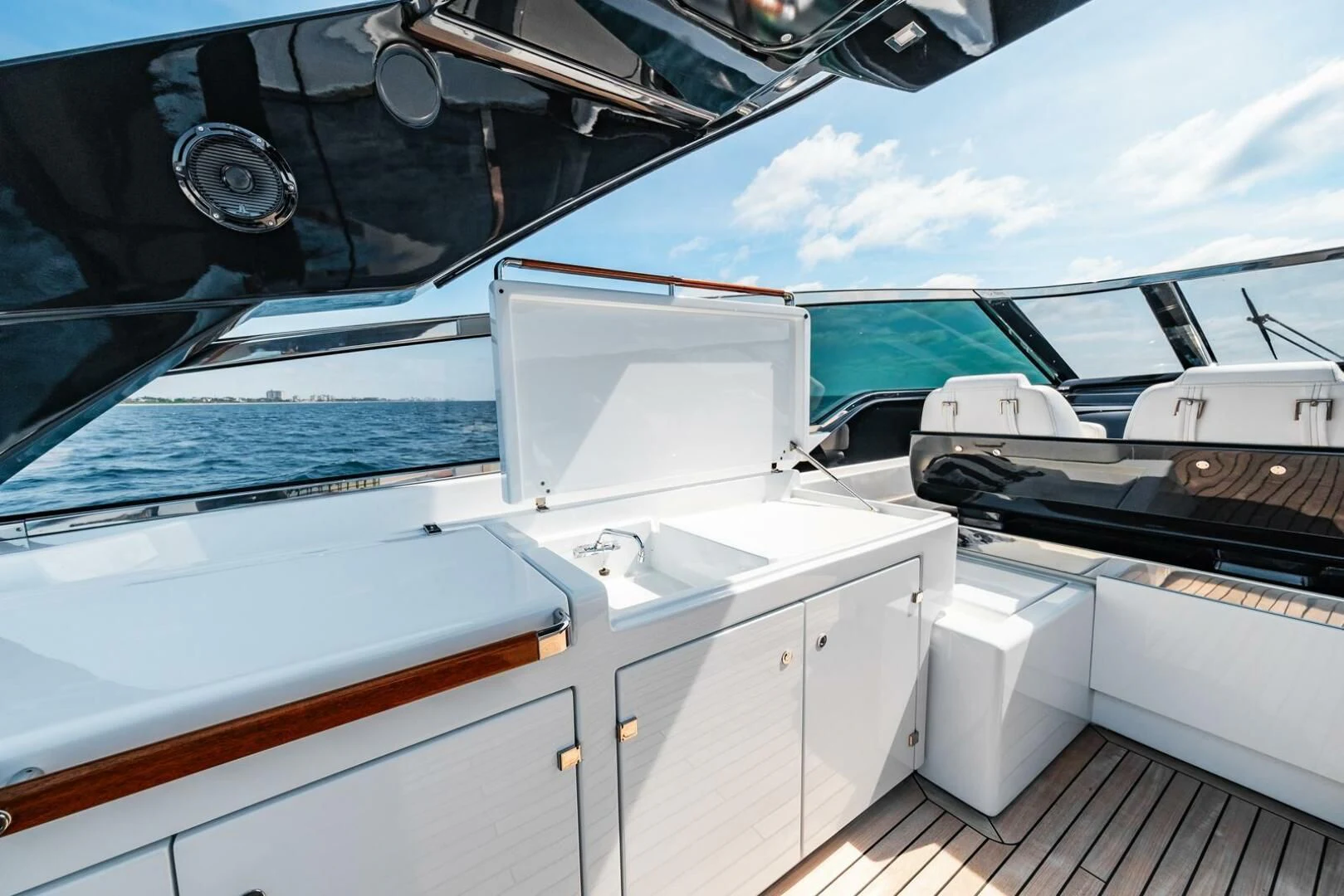 a boat with a large white boat aboard REGENCY Yacht for Sale