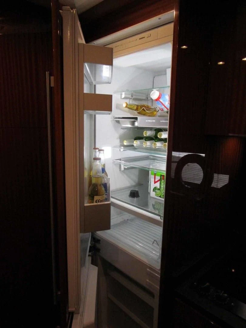 a refrigerator is open aboard REGENCY Yacht for Sale