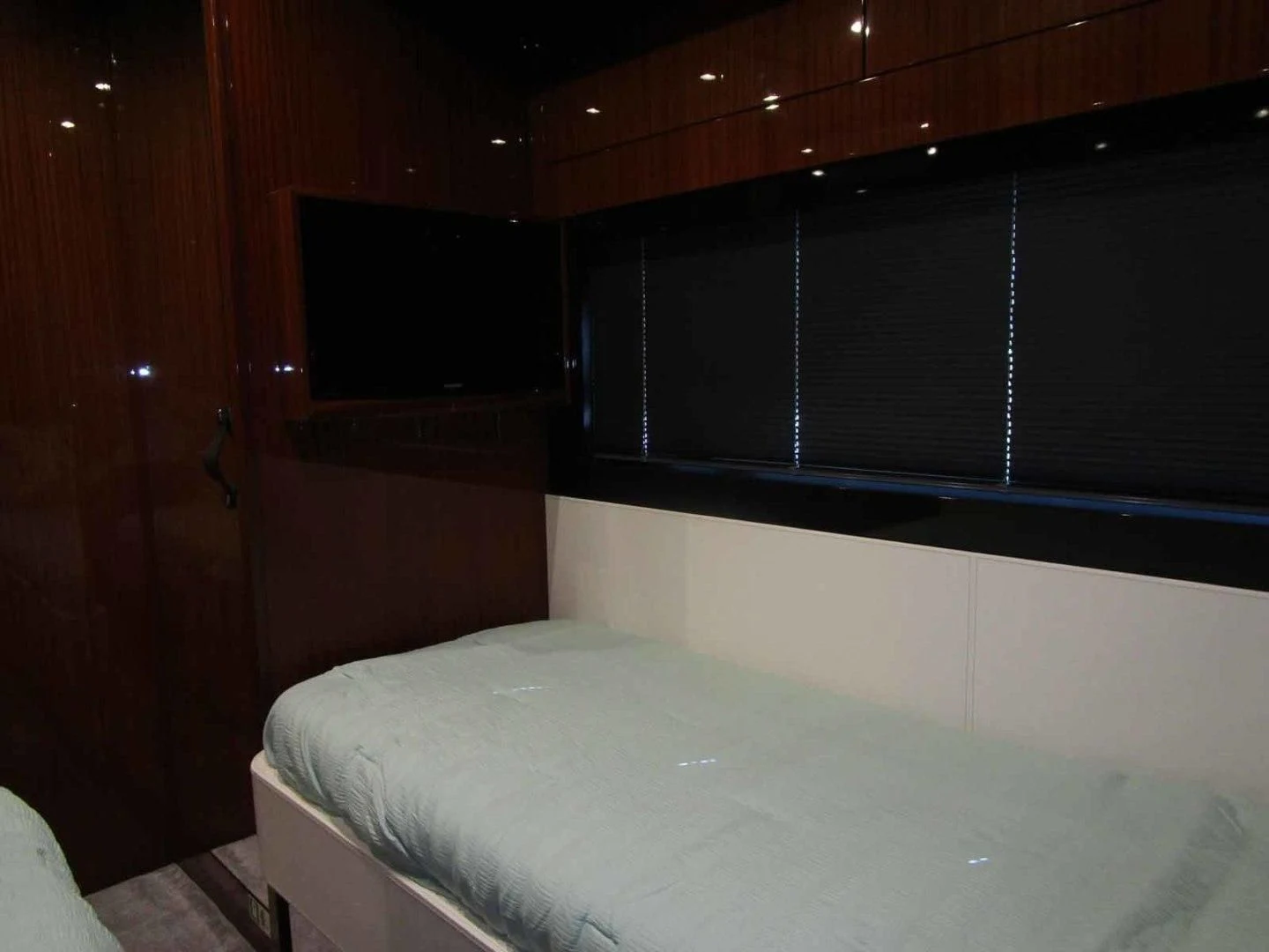 a bed in a room aboard REGENCY Yacht for Sale