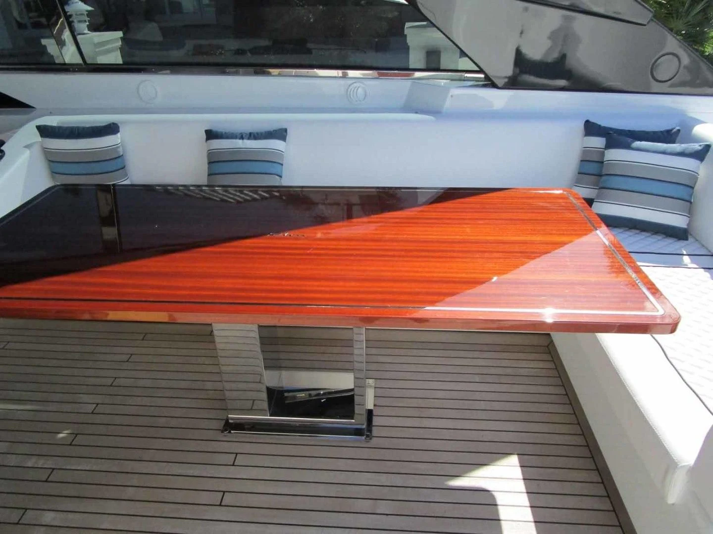 a table with a red and orange tablecloth on it aboard REGENCY Yacht for Sale
